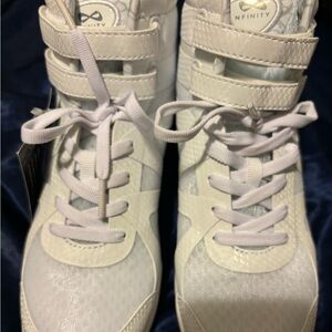 White Nfinity Beast Mid Top Cheer shoe Size 7